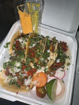 #1 which is 5 tacos these are the Campechano which is asada and chorizo mixed.