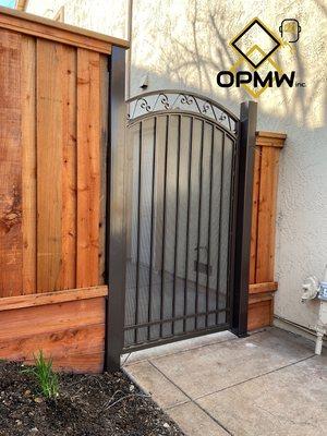 Ornamental custom door with 75% privacy mesh (bronze powder coat finish)