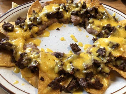 Nachos (the sour cream, jalapeños & guacamole is on the side not in photo) DELICIOUS!  4.3.21