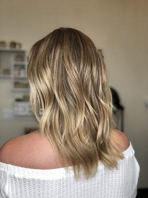 Natural blonde balayage on a golden blonde base