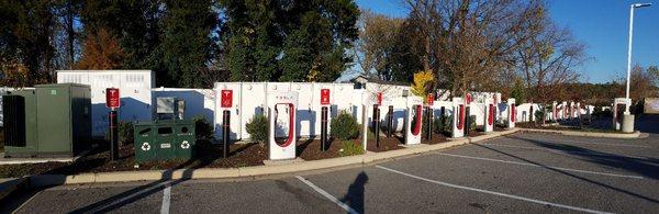 a dozen Tesla charging stations at this Reaux Faux