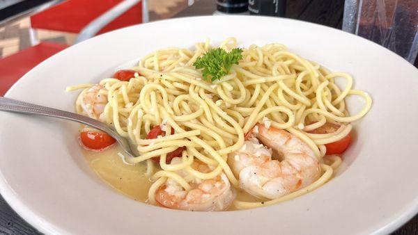 Shrimp scampi over spaghetti