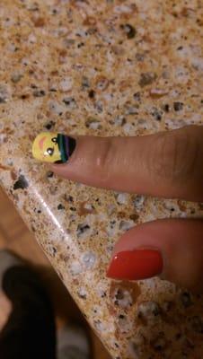 This is one of the many nail ideas I took in and she did a great job! Wildstyle from Lego Movie