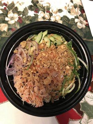 Custom bowl with salmon, fried goodies, onions, and crab salad. Yum.