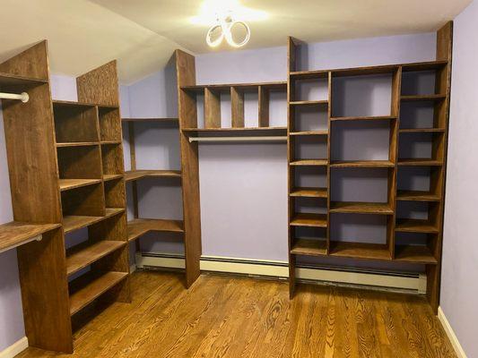 Custom walk in closet with a lot storage space