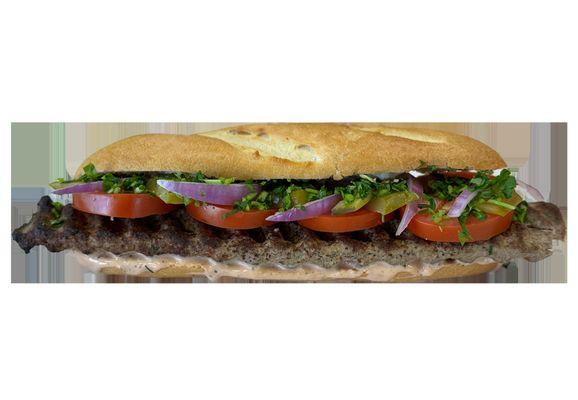 Our Sandwiches made from organic, grass-fed meat options with fresh ingredients served on a French baguette with TKF Signature sauce.