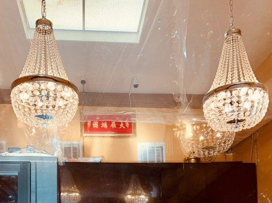 Chandeliers above counter