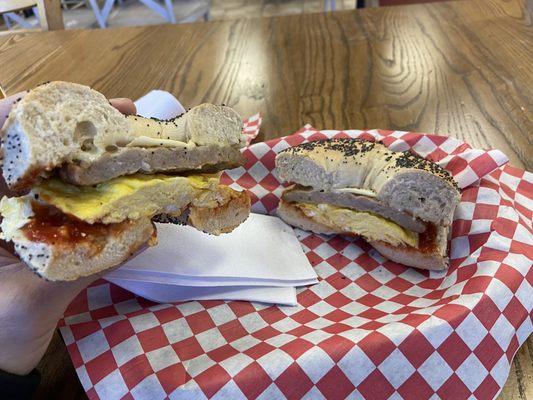 Sausage egg and cheese on a poppyseed bagel