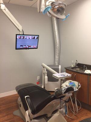 This chair gives you massage while your getting your procedures done and the screen in front of you shows you what the doctor is working on!