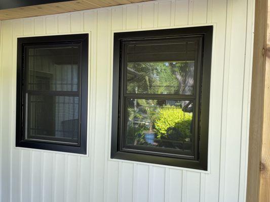 Modern Black Window Replacement complimented with designer etched glass & custom window trim