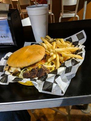 Mushroom swiss hamburger and fries