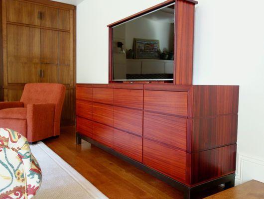 Custom designed and fabricated padauk media cabinet (with internal LCD lift) by American Artisans.