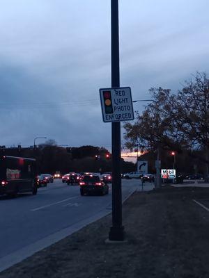 This same intersection had a second sign 100 yards from the actual traffic light as well in Elk Grove Village.