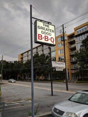 Outside. Street sign on Howell Mill Road. Greater Good is next door to La Fonda.