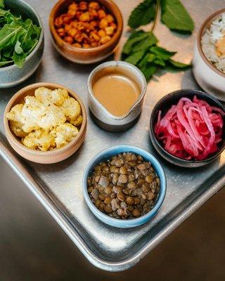 Components making up the seasonal Curry Cauliflower bowl.