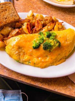 Egg whites, broccoli, & cheese omelette with home fries and toast