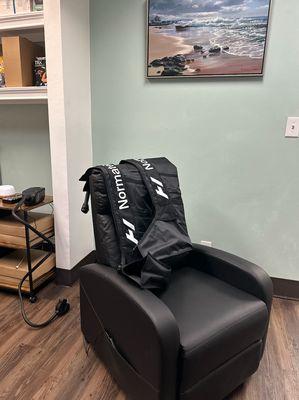 Come and try out our Normatec leg compression recovery station.