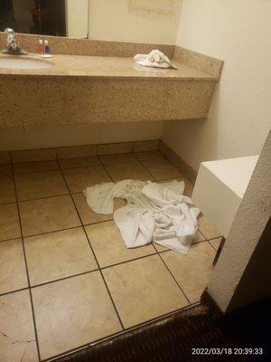 Dirty towels all over the floor!