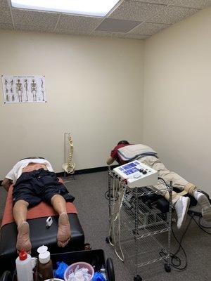 Acupuncture sessions and mechanical traction tables to stretch your lower back.