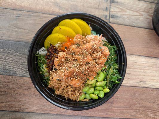 Rice bowl with yellowtail and salmon with most toppings