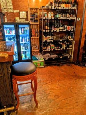 Bar stool and selection of bottled beers