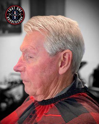 Classic side part haircut at That One Barbershop - sharp, timeless, and expertly styled. Book today for precision cuts!