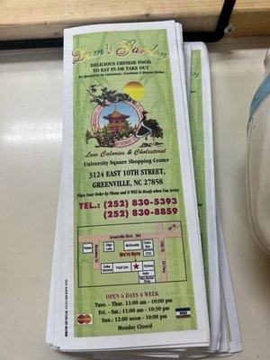 Front of menu with map and contact information