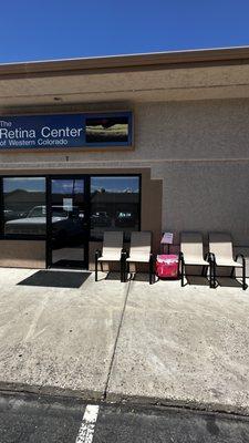 Care providers, husbands, and wives are not allowed inside. Forced to sit outside in the heat.