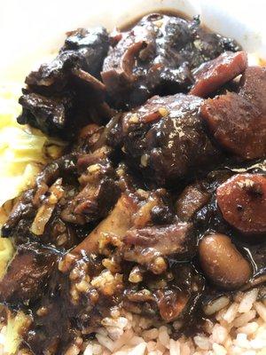 Ox tail dinner with/ beans and rice and cabbage