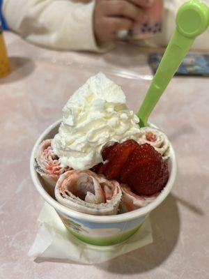 Blueberry ice cream with strawberries on top: