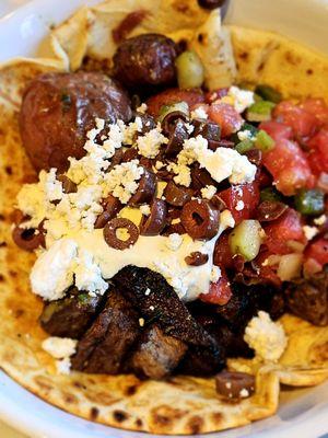 Lamb with Greek salad and lemon potatoes