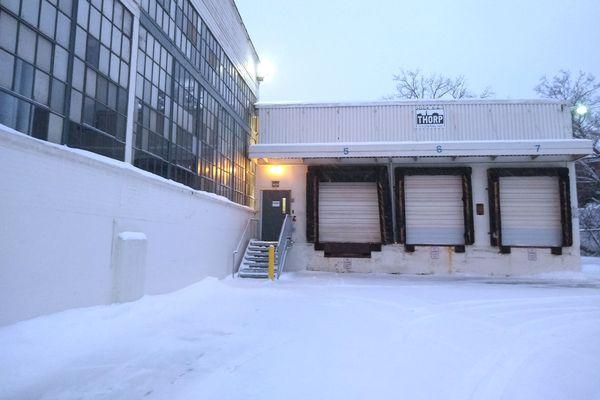 Parking lot is off 18th Ave NE. Enter thru loading dock door, turn left and go thru a couple more doors. We're the second door on the left.