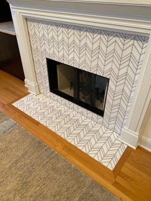 Marble mosaic herringbone fireplace in Bucktown