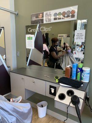 Big sis gets a trim!