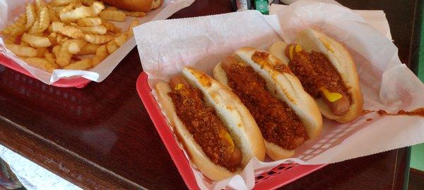 Chili dogs with mustard and fries.....