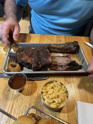 Husband got the brisket and ribs. Juicy and flavorful.