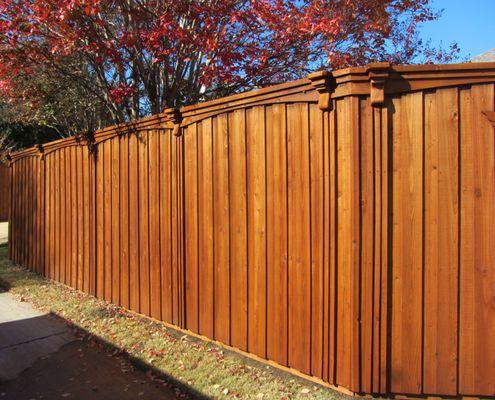 Redwood Stain on a Cedar fence in Plano.