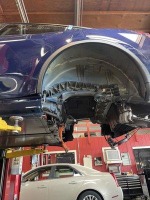 Tesla rear Motor replacement. Certified Tesla Repair