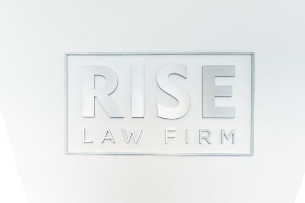 Our name and logo reflect our mission as a law firm - to help our clients rise up, get back on their feet, and stand for justice.