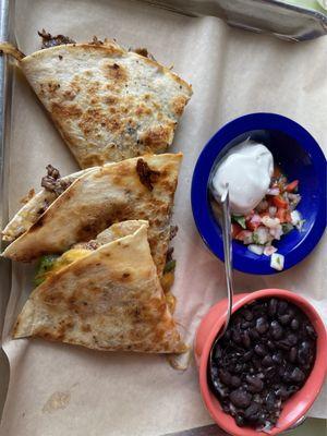 Fajita Quesadilla, beans and rice--cooked excellently! Sour cream and pico degio great too