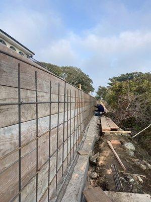 Rebar work, help stabilize retaining wall