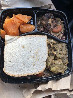 Hard dough bread sweet potatoes, oxtail, curry goat, rice and peas