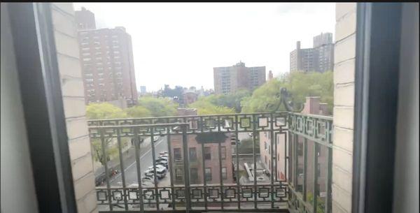 Our Charming Fire Escape On a Cloudy Day. That I May Or May NOT have my morning Tea on.