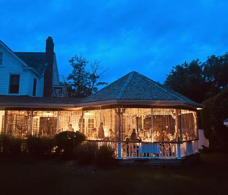 Outdoor covered patio by night