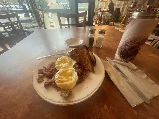 House made corned beef hash and poached eggs.