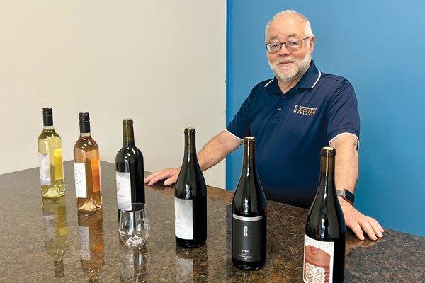 Owner/Winemaker Scott Greenberg showing some of his award-winning wines.