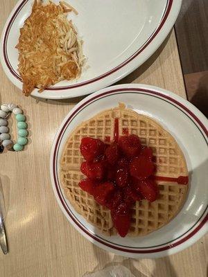 Undercooked hashbrowns, a very undercooked "frozen" waffle, slimy strawberries