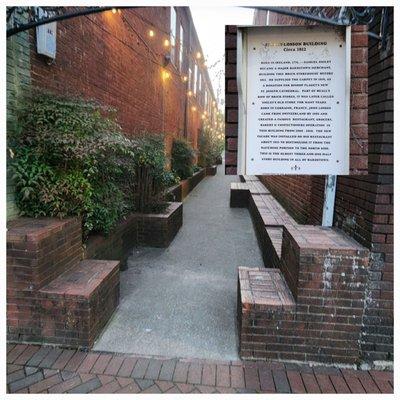 Alley and plaque outside Tap House