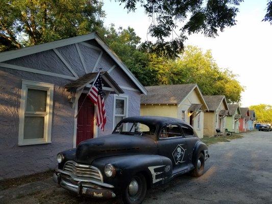 Vintage automotive in front of Motel 3 Johnson Motor Court. San Antonio, Texas.