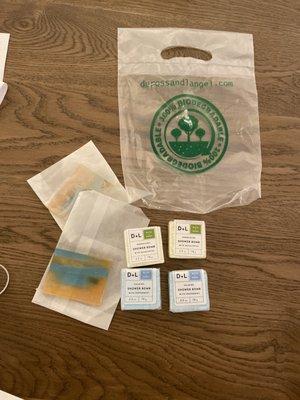 Biodegradable plastic bags, shower bombs and soap samples